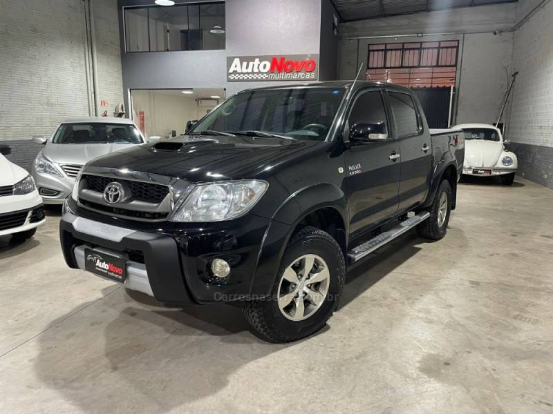 TOYOTA - HILUX - 2009/2010 - Preta - R$ 109.990,00